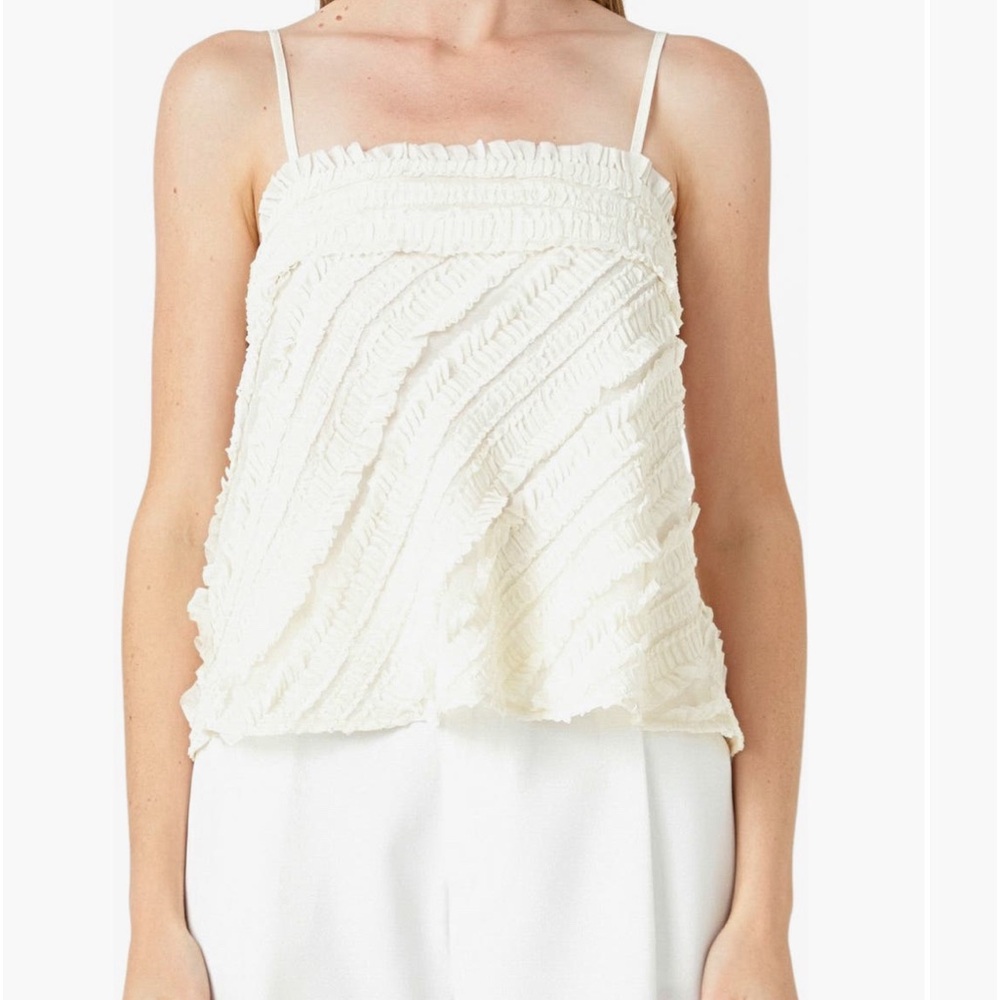 Endless Rose
Ruffle Sleeveless Top